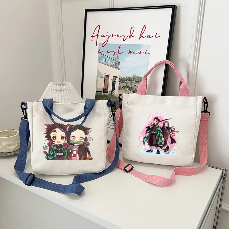 Neue Demon Slayer Mode-Handtaschen mit Cartoon-Anime-Muster, bedruckte Umhängetasche für Jungen und Mädchen, niedliche Umhängetasche, Geburtstagsgeschenke