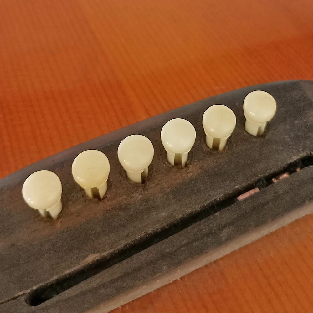 Pasadores de puente de guitarra acústica de hueso Real, pasador de puente de hueso puro con círculo de latón para accesorios de repuesto de guitarra folclórica, 6 uds.