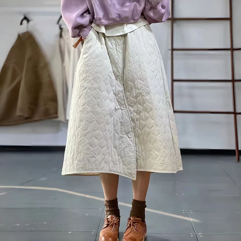 

Чистый цвет, зимняя новая корейская модная антивозрастная свободная индивидуальная однорядная хлопковая юбка с косыми пуговицами и бриллиантами