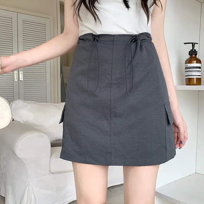 The new summer hot girl style high-waisted design versatile cargo skirt looks slim drawstring cargo skirt