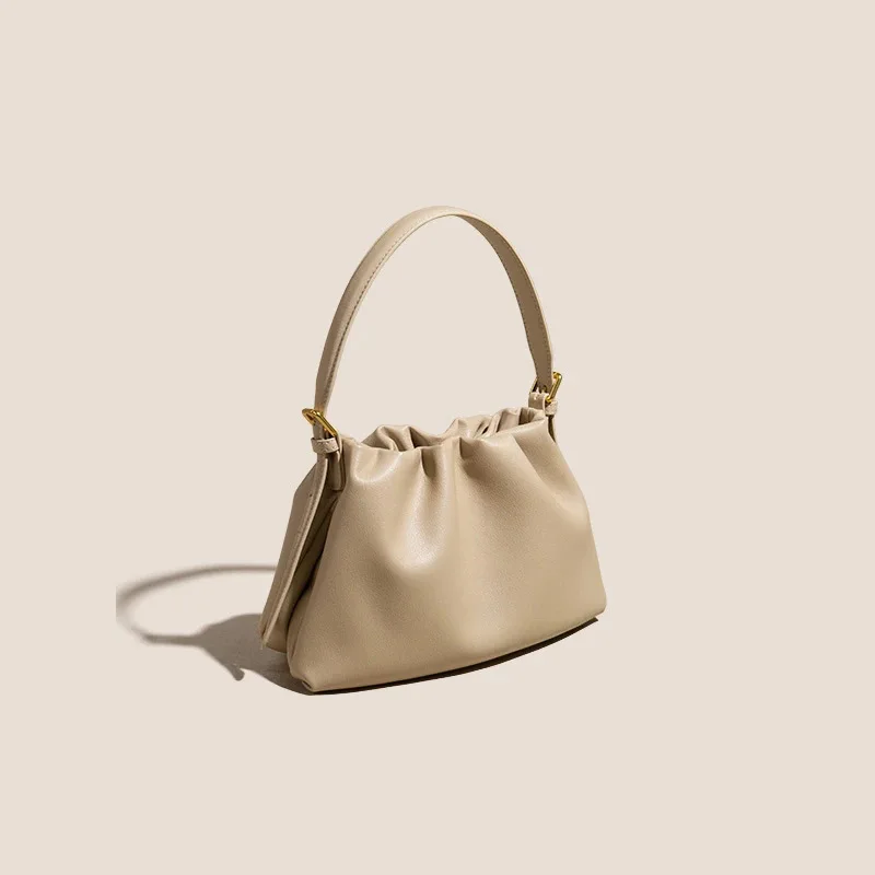 

Small - scale and high - end women's handbags. Stylish, versatile and casual cowhide - body cloud - shaped bags