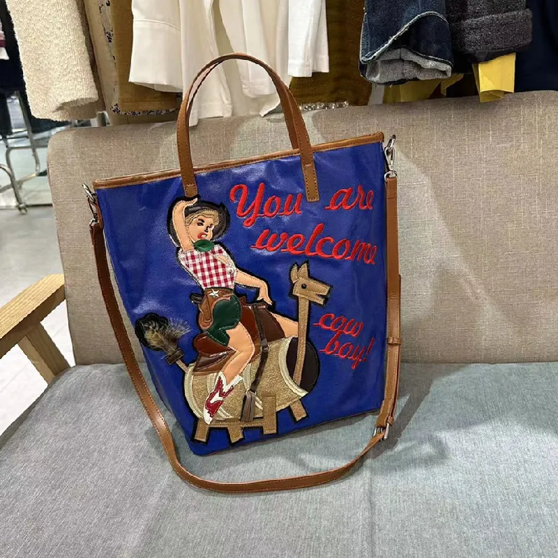 2024 new spliced embroidered cartoon handbag large capacity canvas bucket bag versatile crossbody hand bag ladies  luxury bag