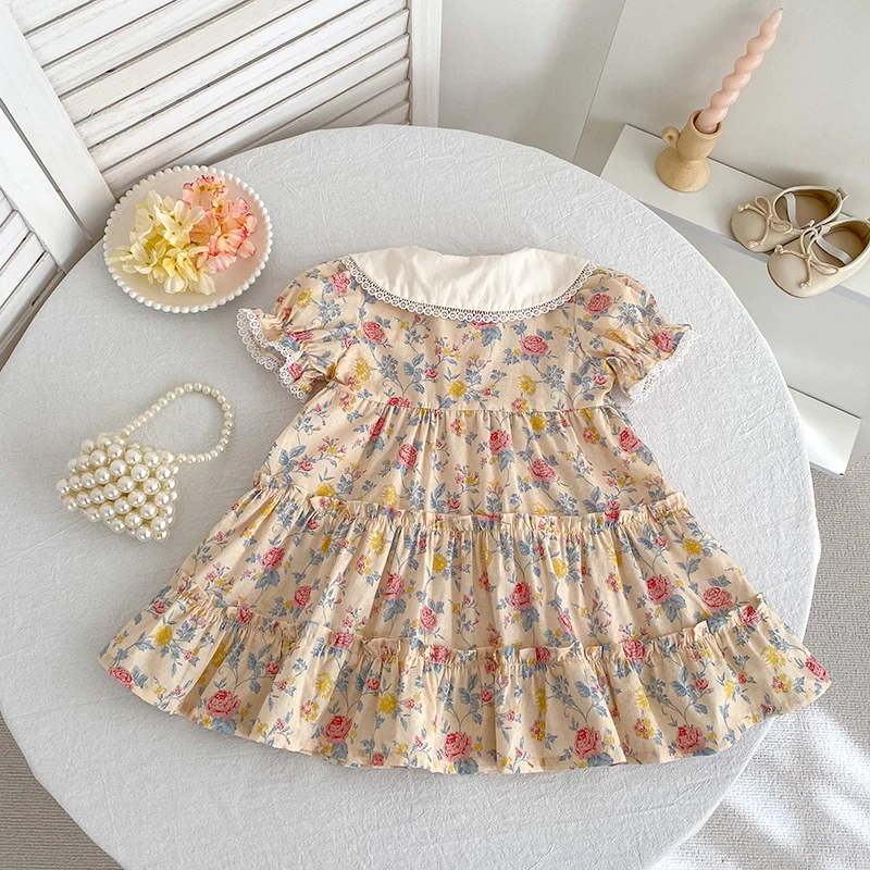 2026 Neues Mädchenkleid für den Sommer 2-6 Jahre Kurzarm-Kleid mit Blumenmuster Gerüschter Kragen Süßes Baumwollkleid – Detail 5