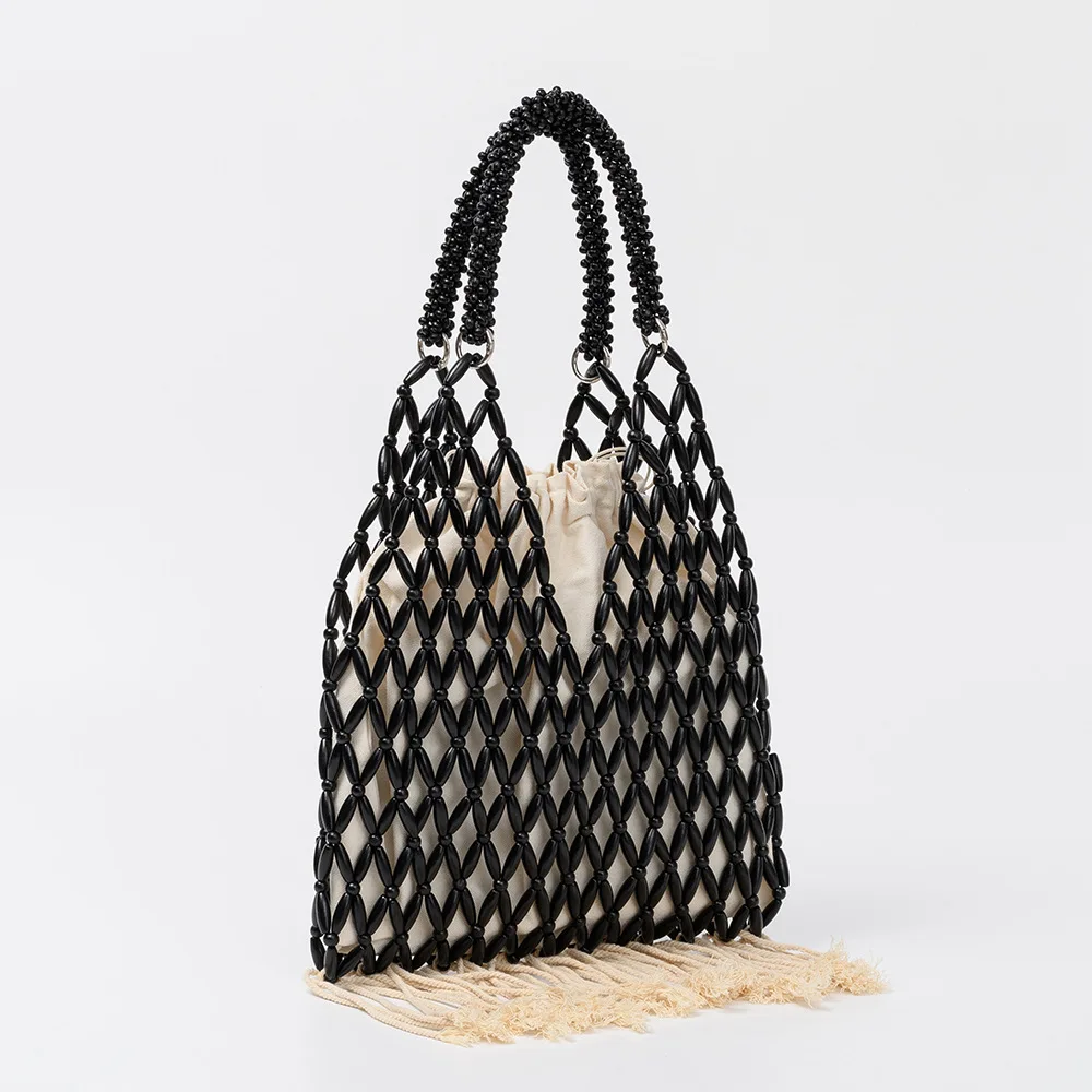 NEW Women Woven tassels design hollow-out wooden bead tote bucket shoulder bag female Reticulate netted canvas beach handbag