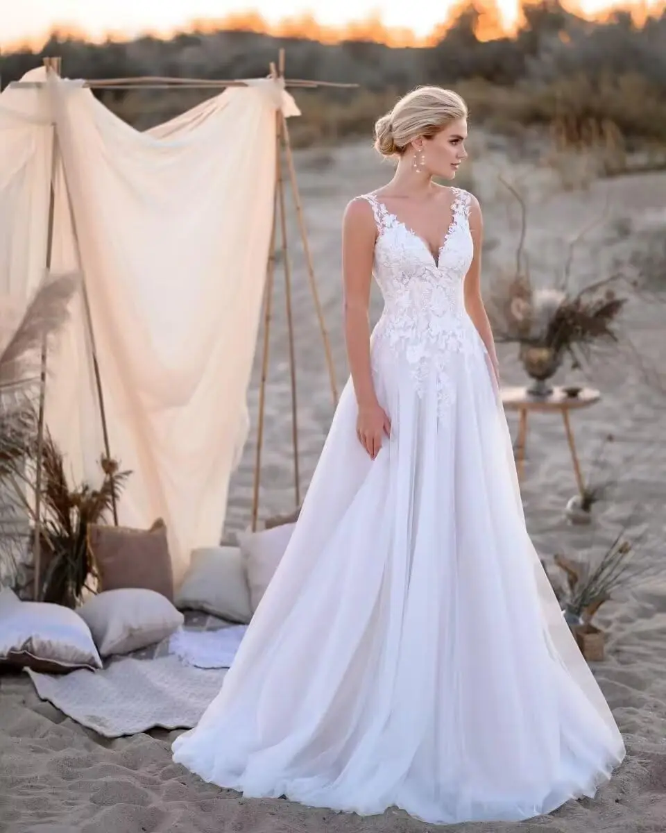 

Sleeveless V Neck A Line Wedding Dresses for Bride Beach Boho Lace Applique Long Bride Gowns