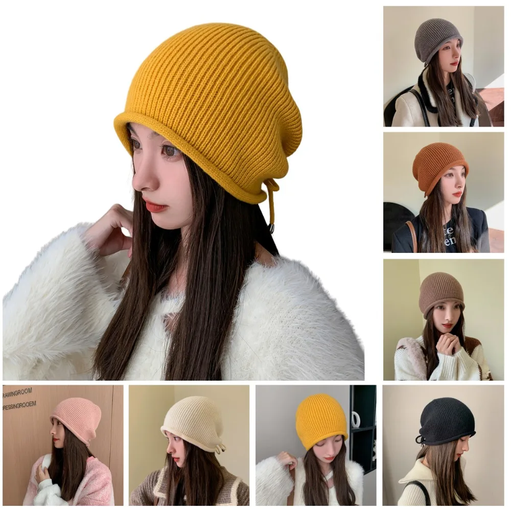 

Hot Sale Knitted Pile Cap Solid Ear Protection Drawstring Stack Hat Windproof Winter Warm Cap Winter