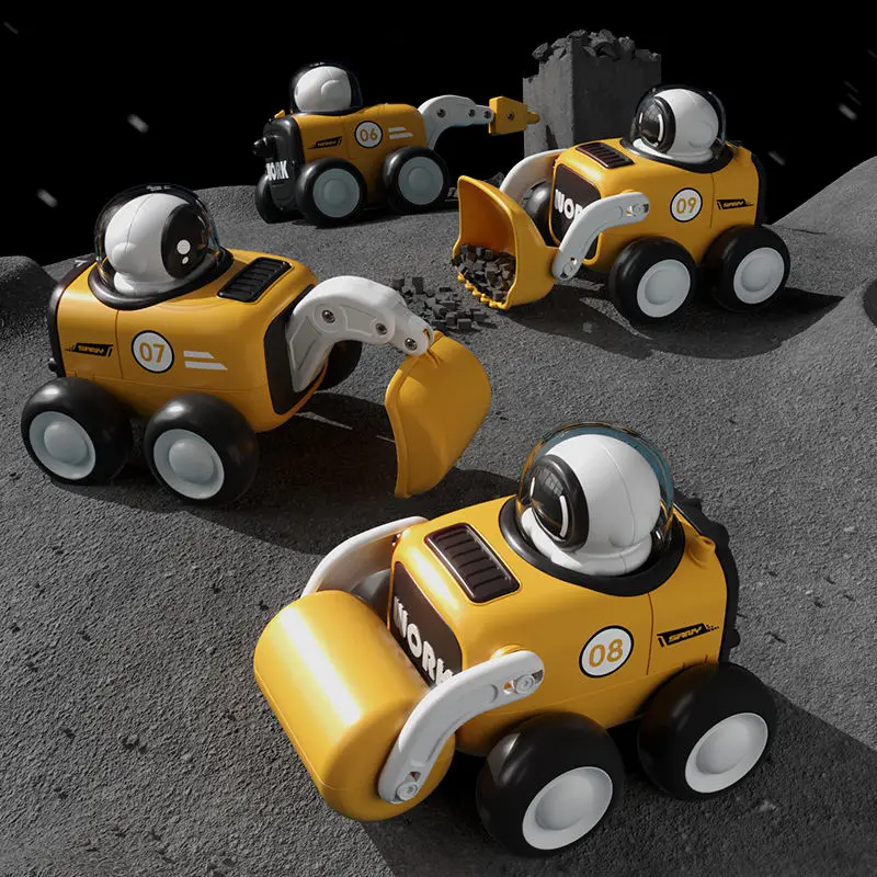 Astronaut presses the forward button on the engineering vehicle toy