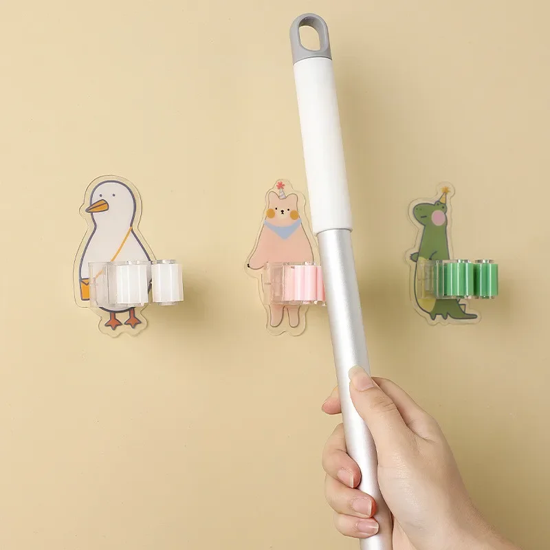 

Cartoon Mop Clip Hole Free Mop Storage Artifact Wall Hanging Storage Rack Powerful Plastic Mop Rack