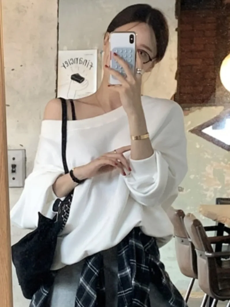 Haut à capuche long et ample pour femme, style décontracté et polyvalent, idéal pour le printemps, parfait pour les trajets quotidiens...