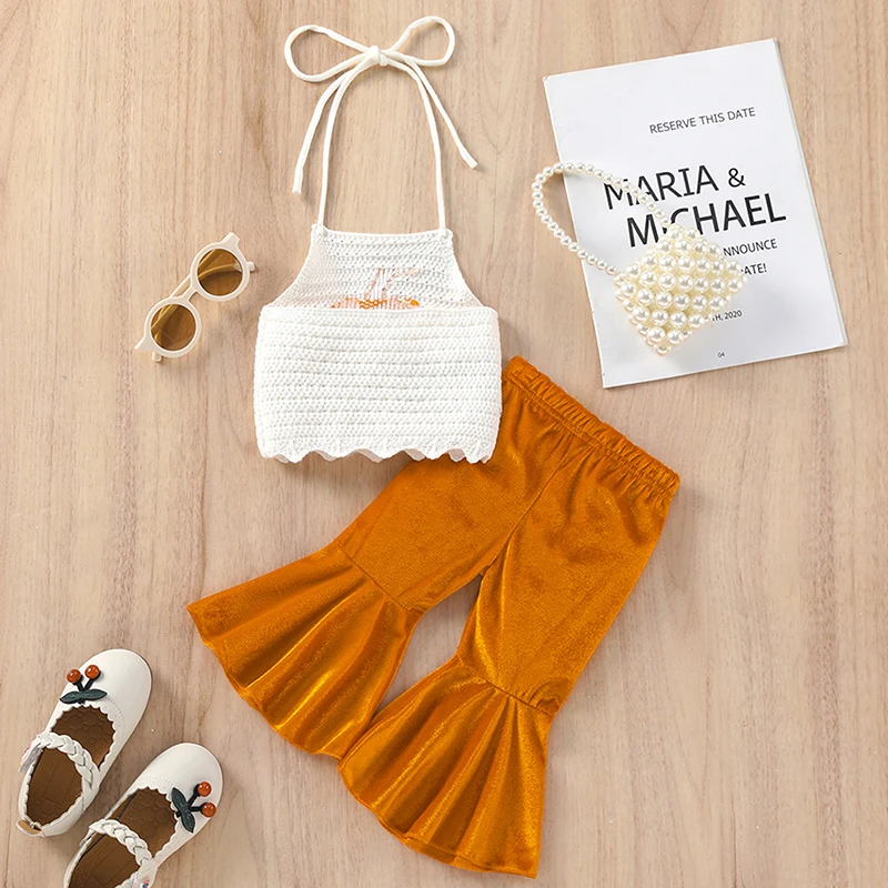 

Adorable Infant Girl Clothing Set featuring Knit Pumpkin Halter Top and Matching Flared Pants in Solid Color