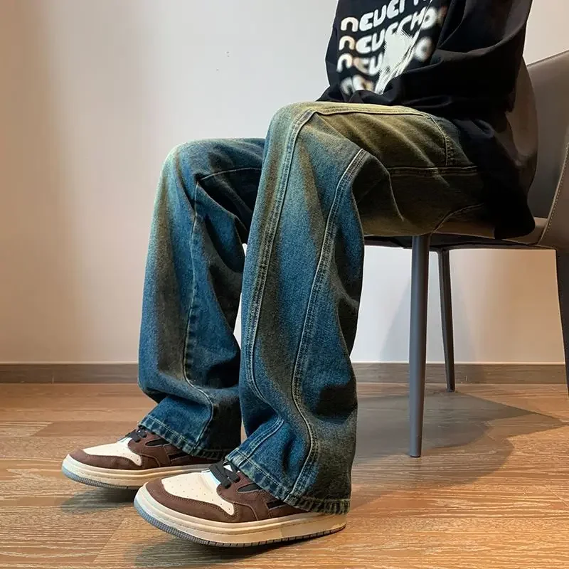 กางเกงยีนส์ผู้ชายทรงหลวมขาบานแบบคาวบอย มีกระเป๋า ทรงตรง เทรนด์ปี 2025 ไซส์ใหญ่ สไตล์สตรีทยุค 90 ย้อนยุค เรโทร เคป๊อป