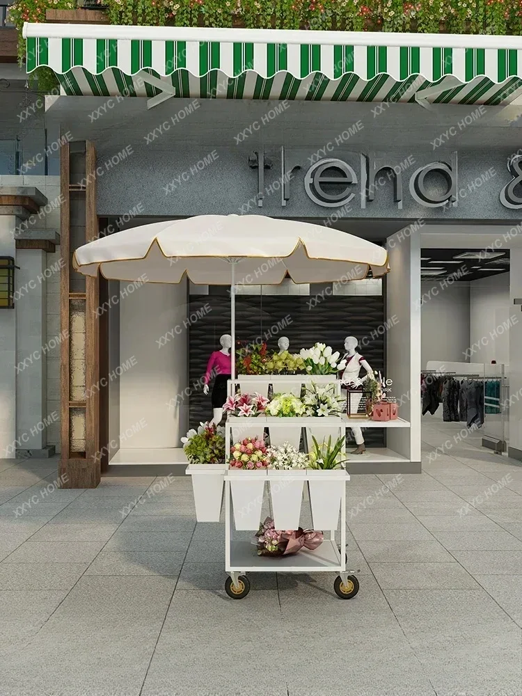 A Street vendors selling flower carts, night markets, outdoor flower shop supplies, flower bouquets, folded multiple layers