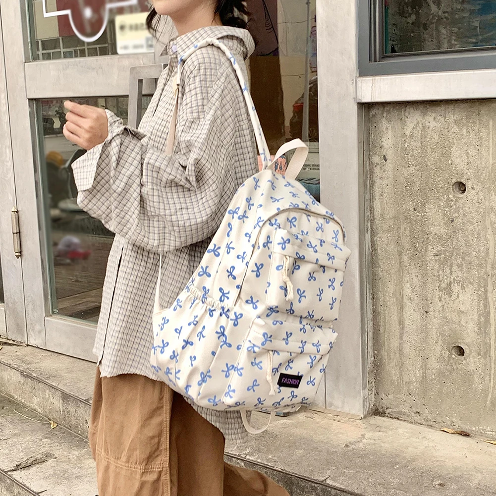 حقيبة ظهر مدرسية مطبوعة على شكل فيونكة حقيبة ظهر جامعية Preppy حقيبة مدرسية متوسطة للفتيات المراهقات