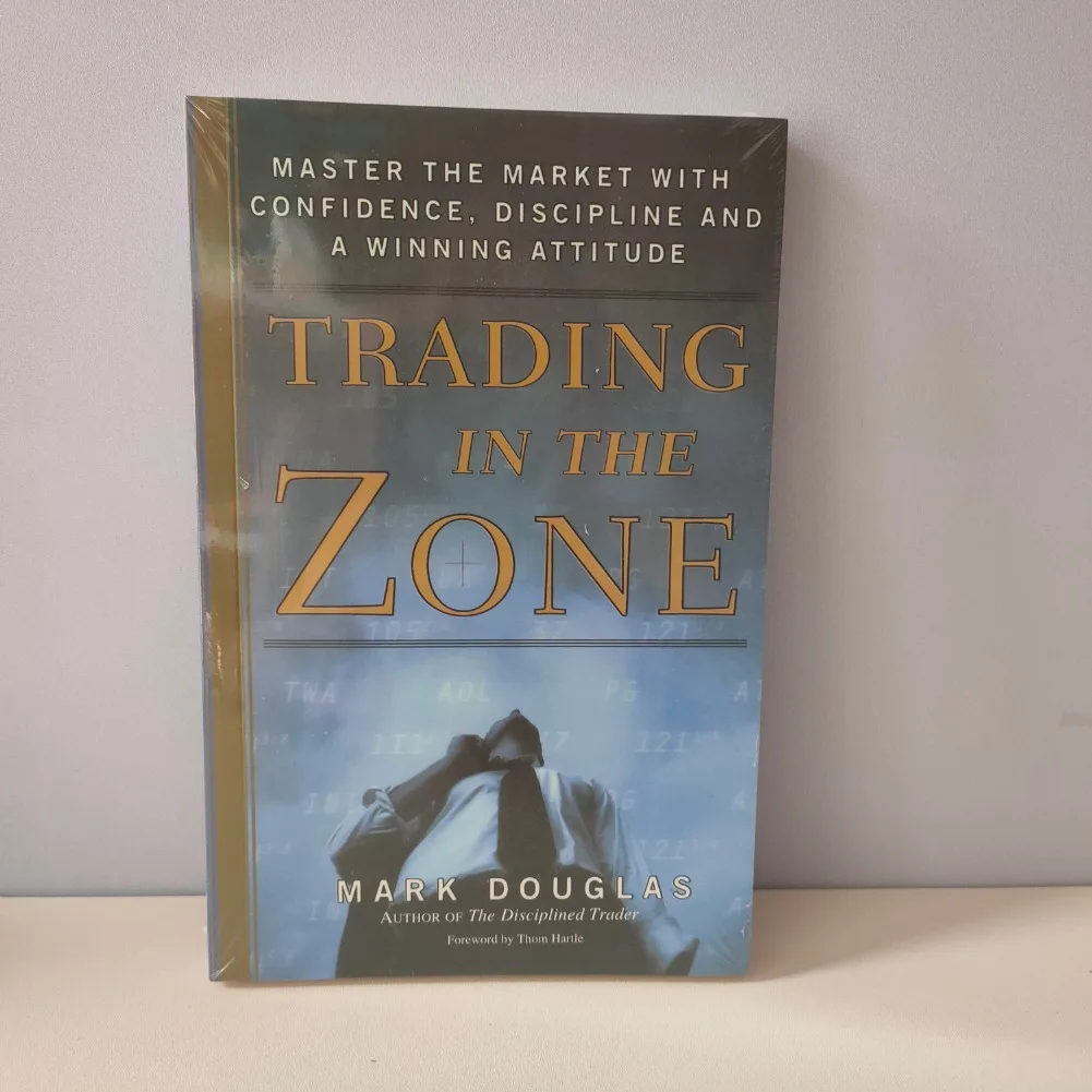 تجارة مارك دوغلاس في المنطقة وغلاف ورقي لكتب التاجر المنضبط باللغة الإنجليزية