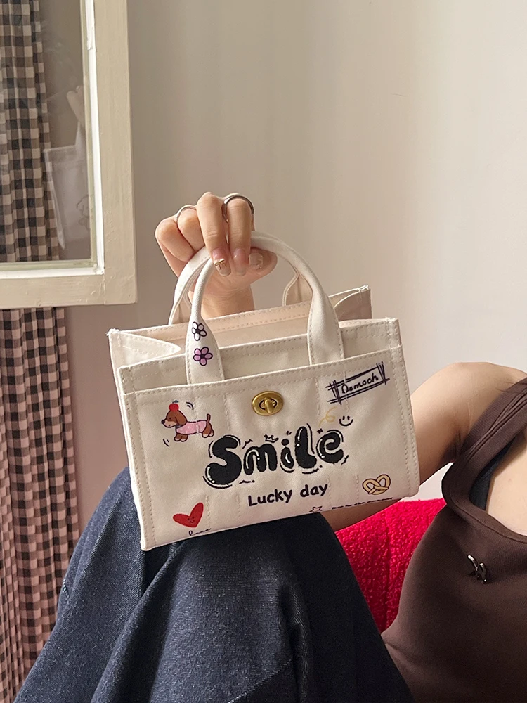 

Faionable Small fiti Embroidery Letter Canvas Tote Bag Crossbody Handbag for Teen Girls Commuter Sle Zipper Closure
