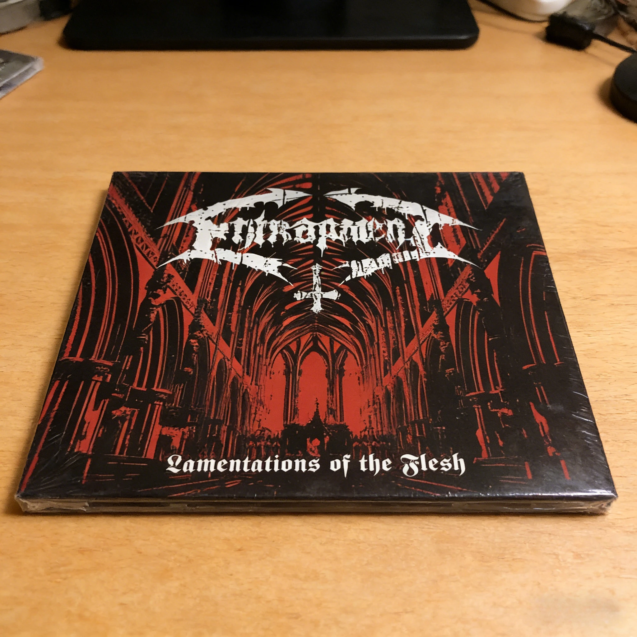 

Классический альбом в стиле олдскул-дэт-метал Entrapment Music CD Lamentations of The Flesh 2014, издание SoulSeller Records.