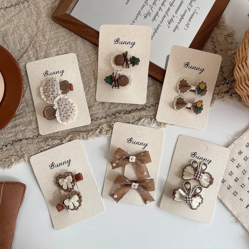 

2 шт./лот, детские заколки для волос, бант из жемчужной ткани, детская заколка для волос, милая челка для девочек, боковой зажим, заколки, головные уборы, детские аксессуары для волос