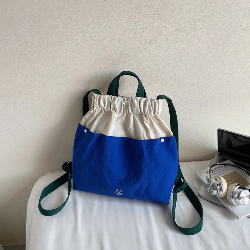 Outdoor lightweight backpack for women traveling lightweight dopamine color blocked waterproof nylon cloth backpack