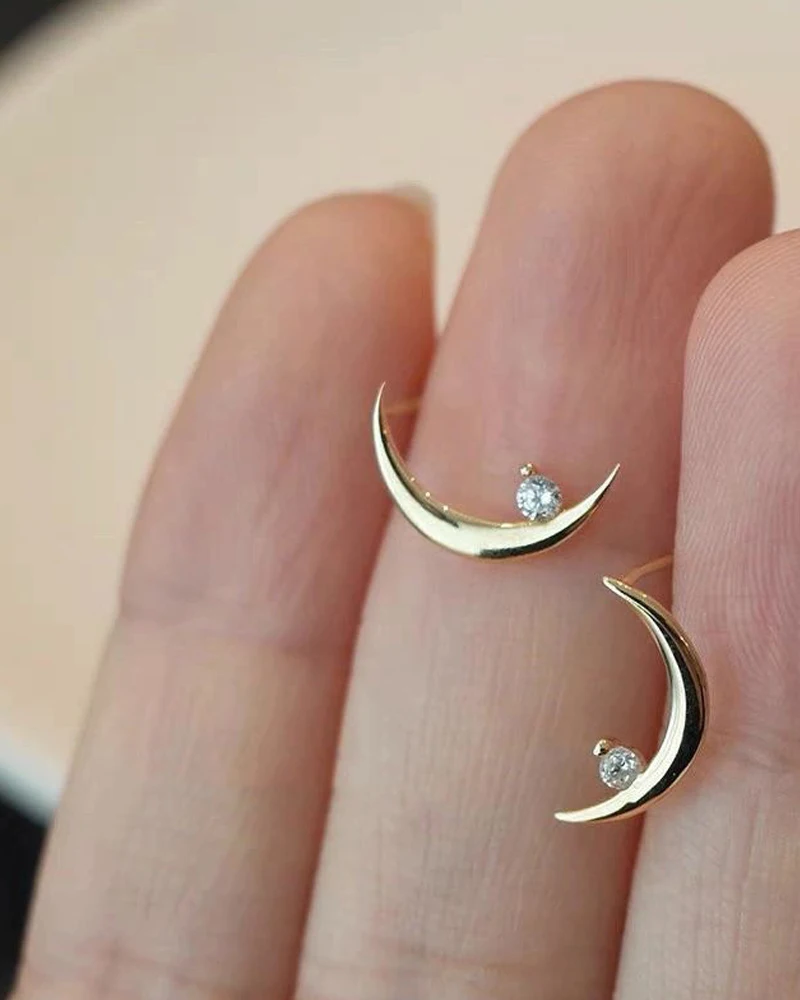 Crescent shaped diamonds set with elegant earrings