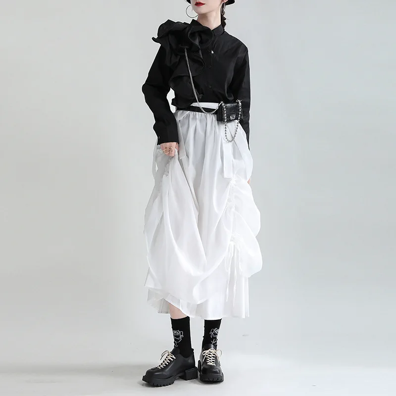 Design sense black suspender skirt 2024 spring clothes high waist slimming mid-length drawstring half skirt female