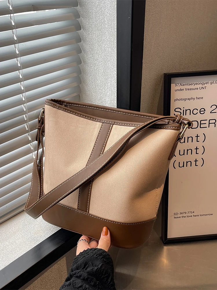 

New 2026 Fashion Canvas Bucket Tote Bag Women's Casual Shoulder Bag Commuting Bag Soft Canvas Large Capacity Single Strap