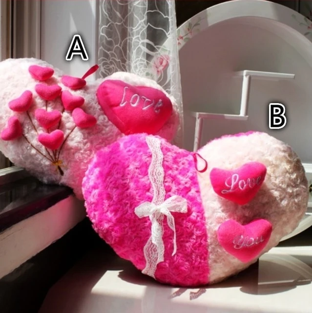 Almohada en forma de corazon sales