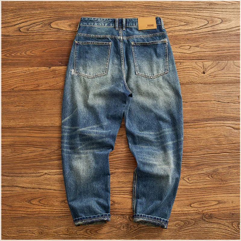 

Fake hole sticking fabric retro distressed jeans for young men, heavy weight straight tube loose denim pants, 2025 autumn