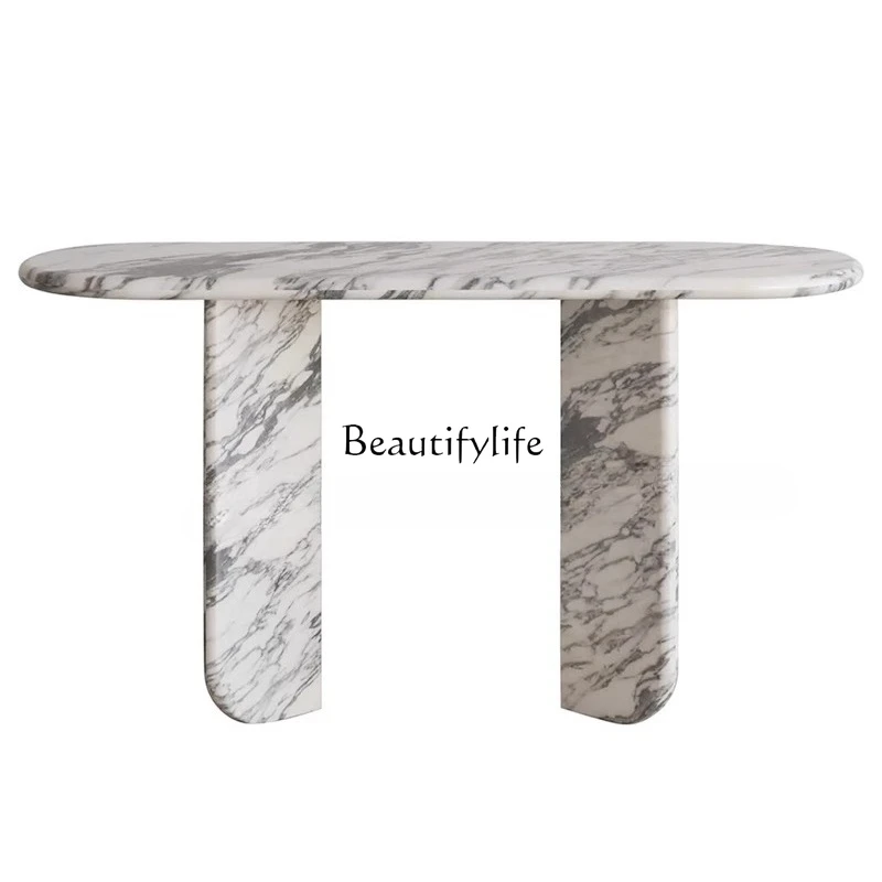 

Italian minimalist natural marble entrance table against the wall large white light luxury case