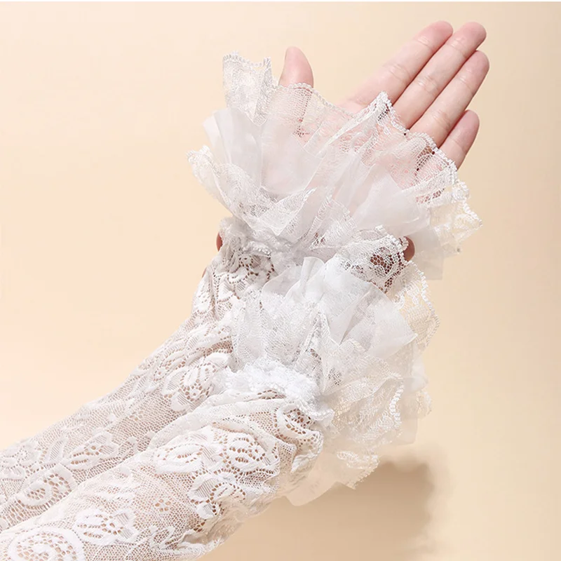Guantes de encaje con hermosas flores para niña, protección solar de verano a la moda, mangas largas ahuecadas, guantes de boda sin dedos