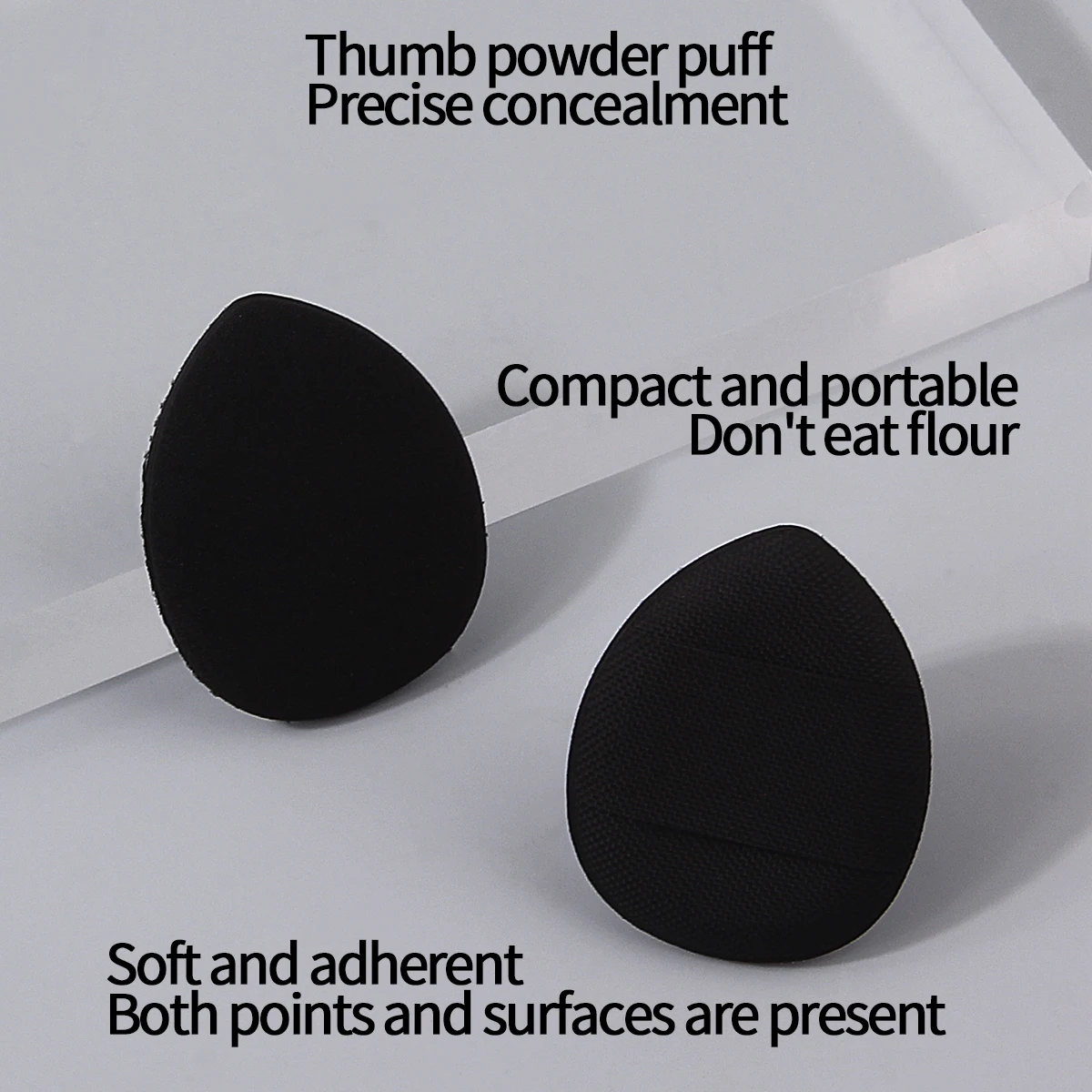 100PCS super affordable black mini makeup thumb powder puff, no powder sticking, easy to use, portable professional makeup tool
