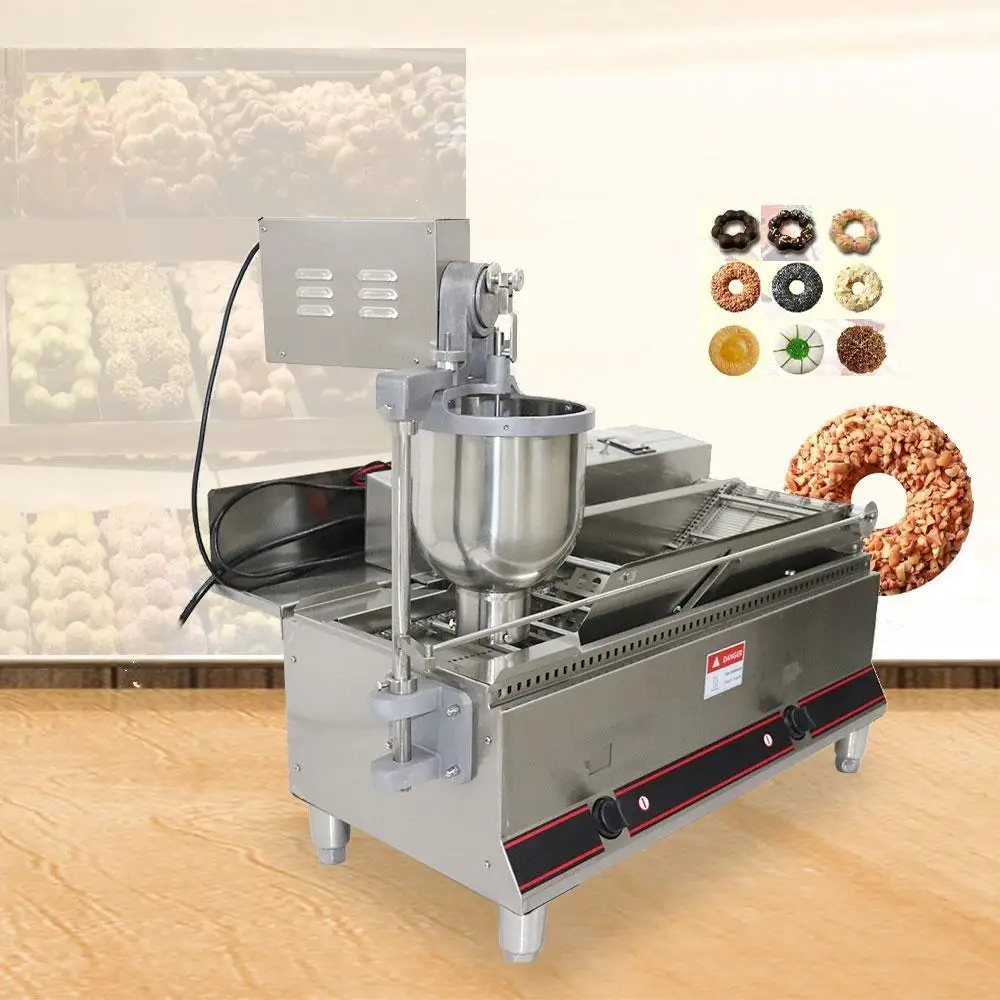 Friggitrice per ciambelle completamente automatica OEM Macchina per pasta elettrica Macchina per fare ciambelle in acciaio inossidabile per uso alimentare commerciale