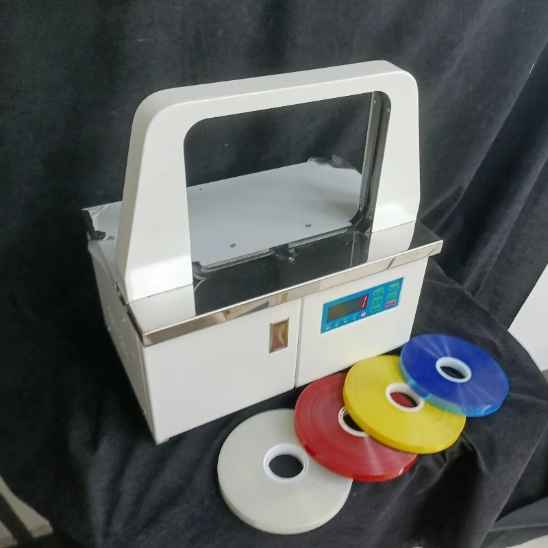 Width 12mm Plastic Opp Film Strapping Machine Strapping Machine Printing PVC Card Strapping Machine for Card Factory