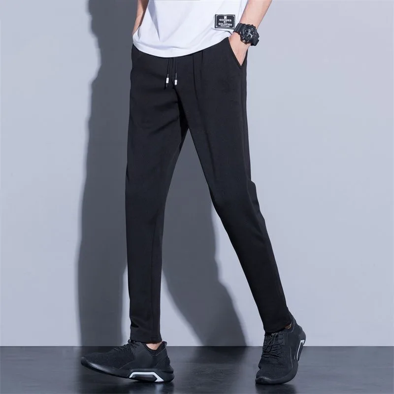 Pantalones informales de pierna recta para hombre, calzas ajustadas con cordón, versátiles, color negro, novedad de verano, 2023