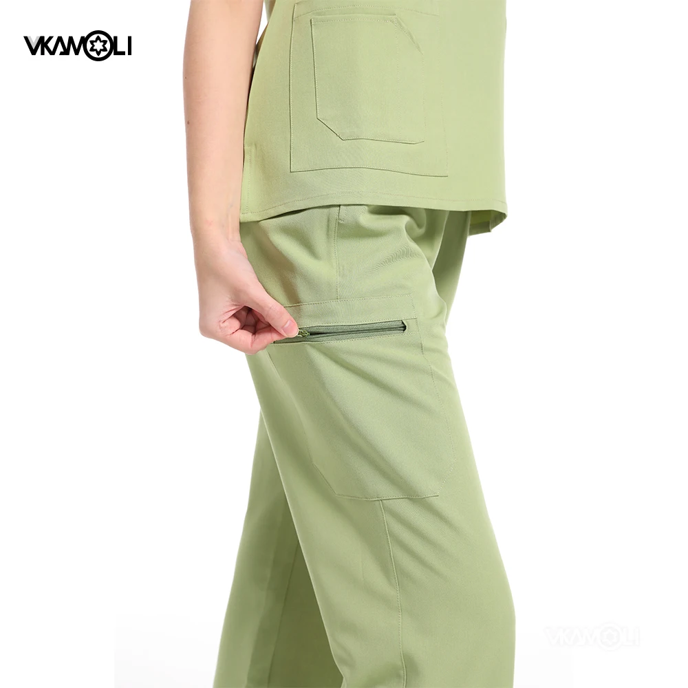 Traje de operación ajustado para mujer, conjunto de uniforme médico, tops y pantalones con múltiples bolsillos