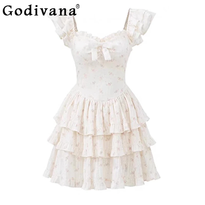 

Korean Sweet Floral Print Bow Flying Sleeve White Princess Dress Girl Summer Square Neck High Waist Age Reduction Cake Dresses