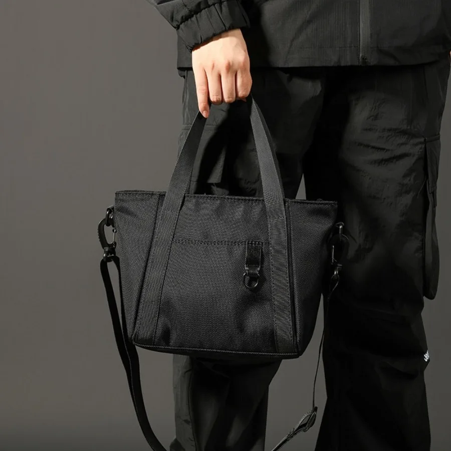 

【Новый стиль】Сумка-тоут из баллистического нейлона с индивидуальным логотипом, мужская сумка-рюкзак для поездок на работу, сумка для покупок, простая сумка-тоут, модная портативная сумка.