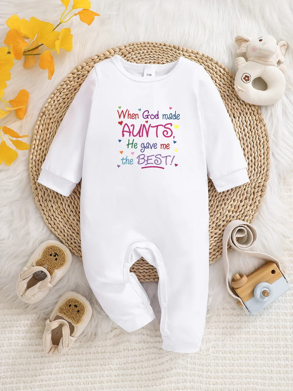 Baby long-sleeved crawling romper, fun letter print, button design, easy to care for, suitable for new parents.