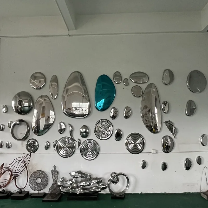 Modern light luxury mirror stainless steel stone wall decoration, living room model room wall hanging surface, sculpture metal p