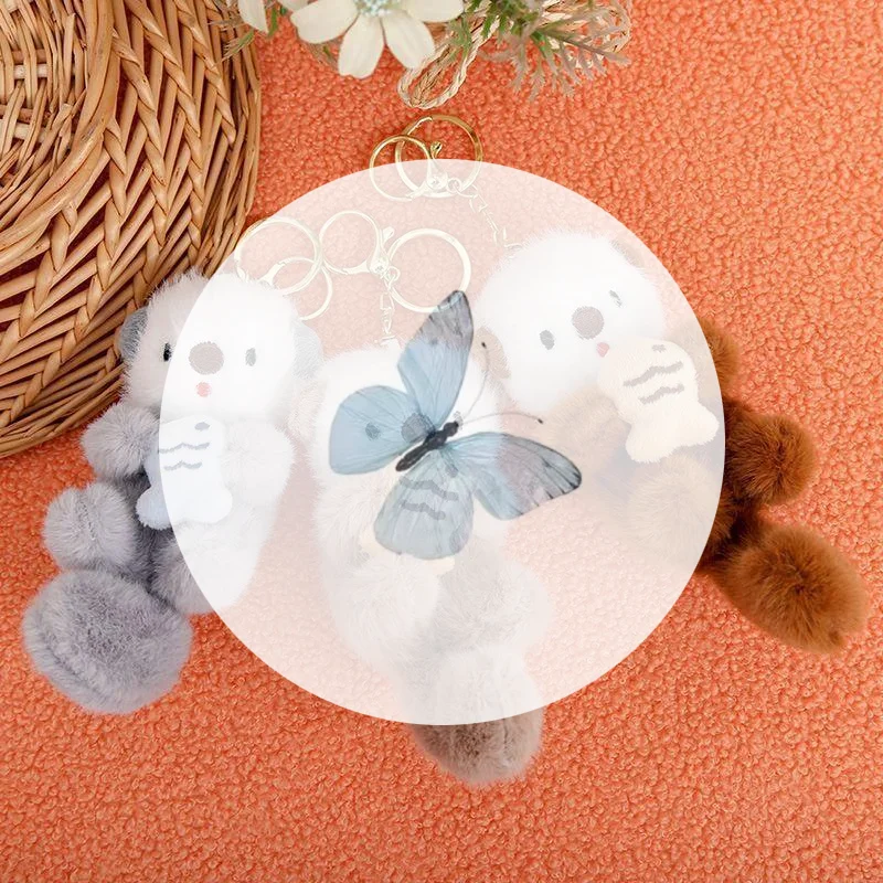 

Милый плюшевый брелок с выдрой, держащий рыбу, модный рюкзак, брелоки с животными, сумка, кошелек для ключей, кулон, игрушка, подарок для девочек