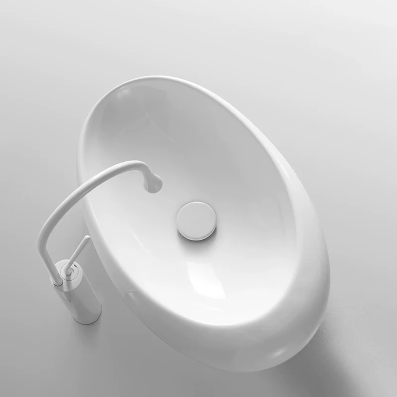 Elegant Ceramic Vessel Sink, Oval-Designed Ceramic Washbasin - an Ideal Choice for Modern Bathroom Fixtures, Suitable for Dressing Rooms, Vanity Tables, and Bathrooms