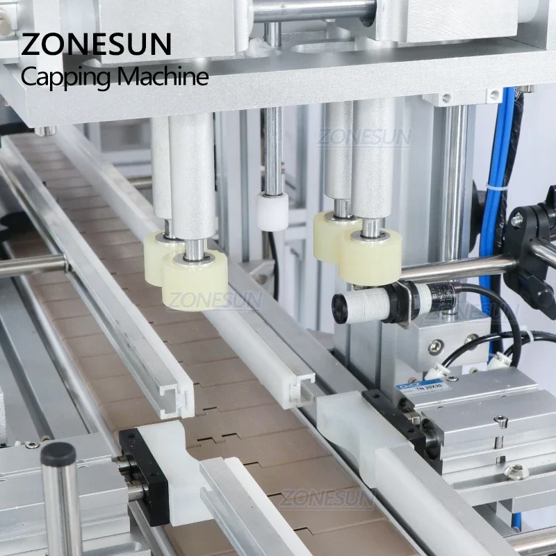 ZONESUN Kundenspezifische automatische Abdeckmaschine für Kosmetika, Saft und Getränkeflaschen mit Vibrationsverschluss für die Produktion