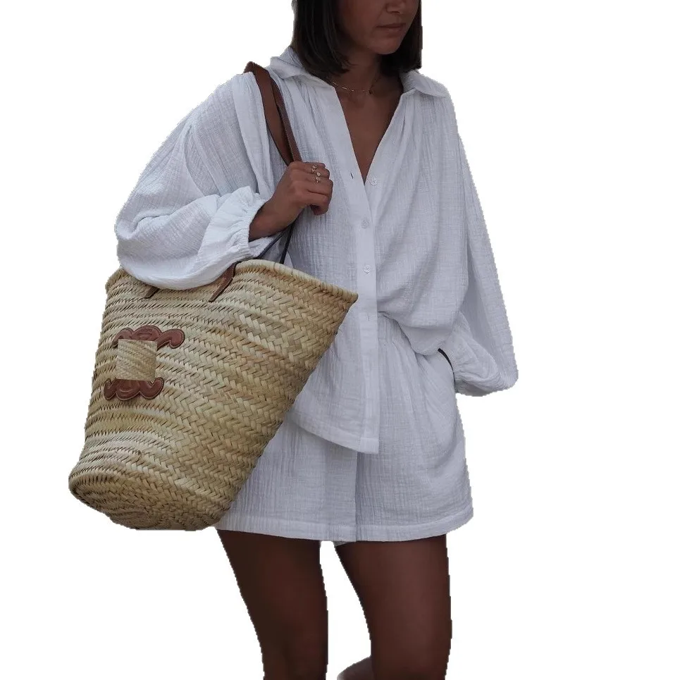 ชุดเสื้อแขนยาวสีทึบสองชิ้นของผู้หญิงชุดกางเกงขาสั้นลำลองสำหรับฤดูร้อนปี 2025