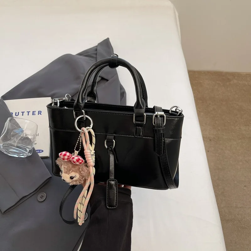 

Корейская версия портативной сумки-мешки женская, новинка 2023 года, модная универсальная сумка через плечо, нишевая повседневная сумка-мессенджер