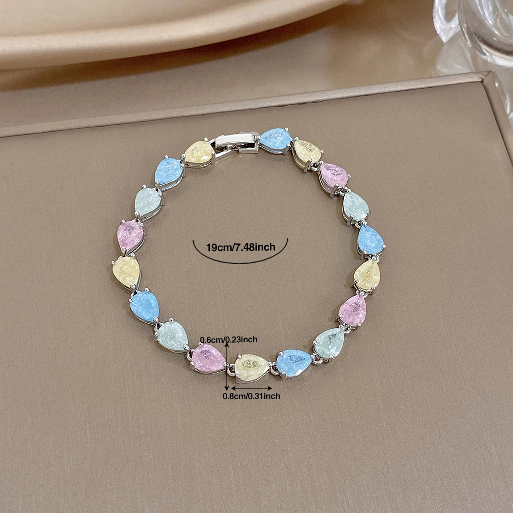 AENSOA Marken-Armband für Damen, modisch, aus Edelstahl, in Macaron-Farben, mit Wassertropfen-Zirkonia-Elementen, klassisch, wasserdicht, für Partys – Detail 9
