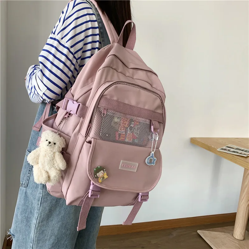 

TRAVEASY 2023 New Cute Badge Preppy Nylon Multi Pockets Women Backpack High School Girls Schoolbags Female Laptop Bag