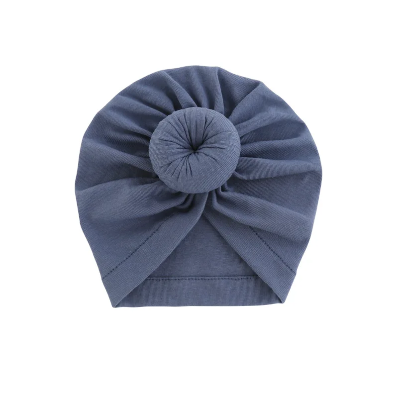 Solidna bawełna pączki Baby Boy dziewczyny czapka z daszkiem 0-2T słodkie nowonarodzone Skullies czapki miękki turban indie Topknot Headwraps