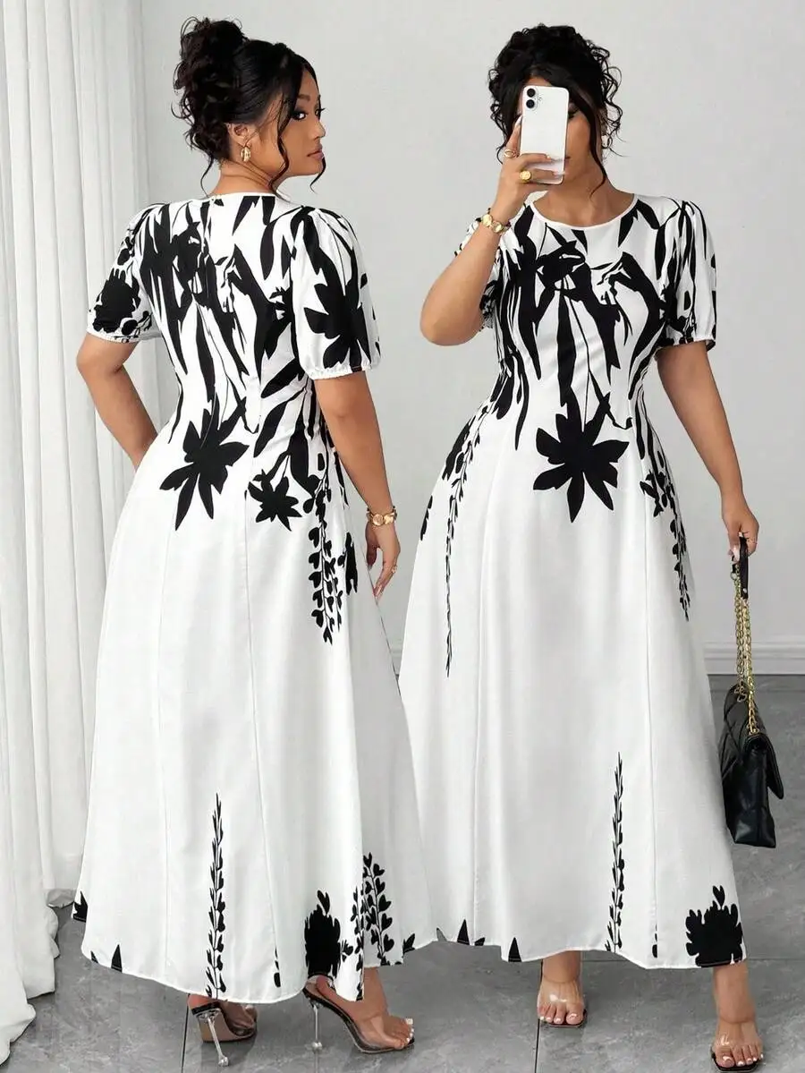 

Элегантное платье миди А-силуэта с черным цветочным принтом, пышными рукавами и зауженной талией