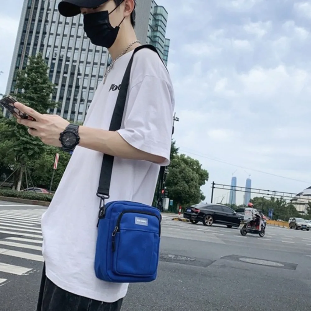 ไนลอนกระเป๋าสะพายชายสแควร์ผ้าใบความจุขนาดใหญ่กระเป๋าสะพายข้างปรับไหล่มัลติฟังก์ชั่กีฬากระเป๋าโทรศัพท์กระเป๋าเดินทาง