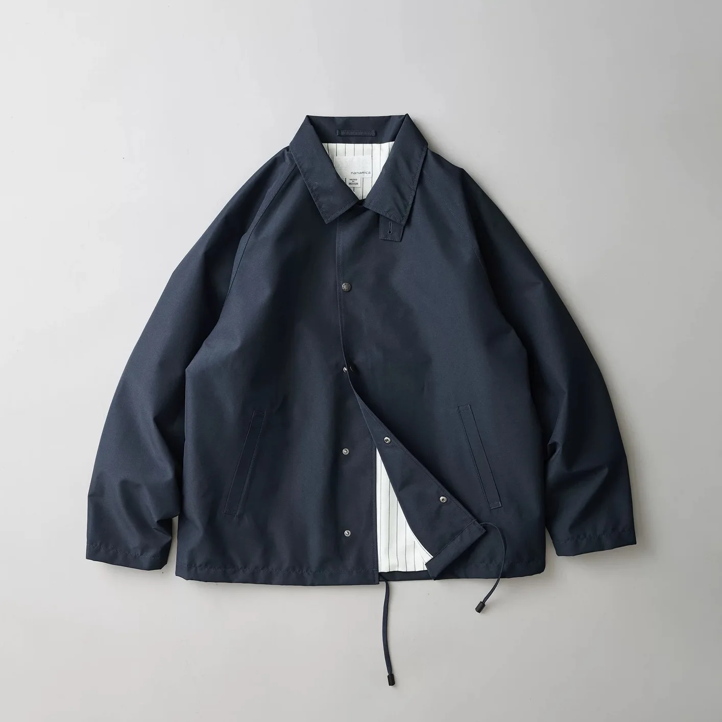 

Водонепроницаемая функциональная тренерская куртка NANAMICA 2L