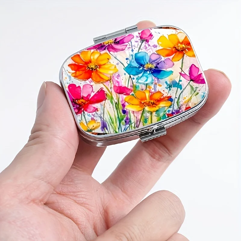 A Portable Rectangular Vitamin Storage Box with 2 Compartments, Featuring a Colorful Floral Design, Perfect for Placing in a Purse or Bag, with Vibrant Colors, Also Suitable as a Gift for Small Items